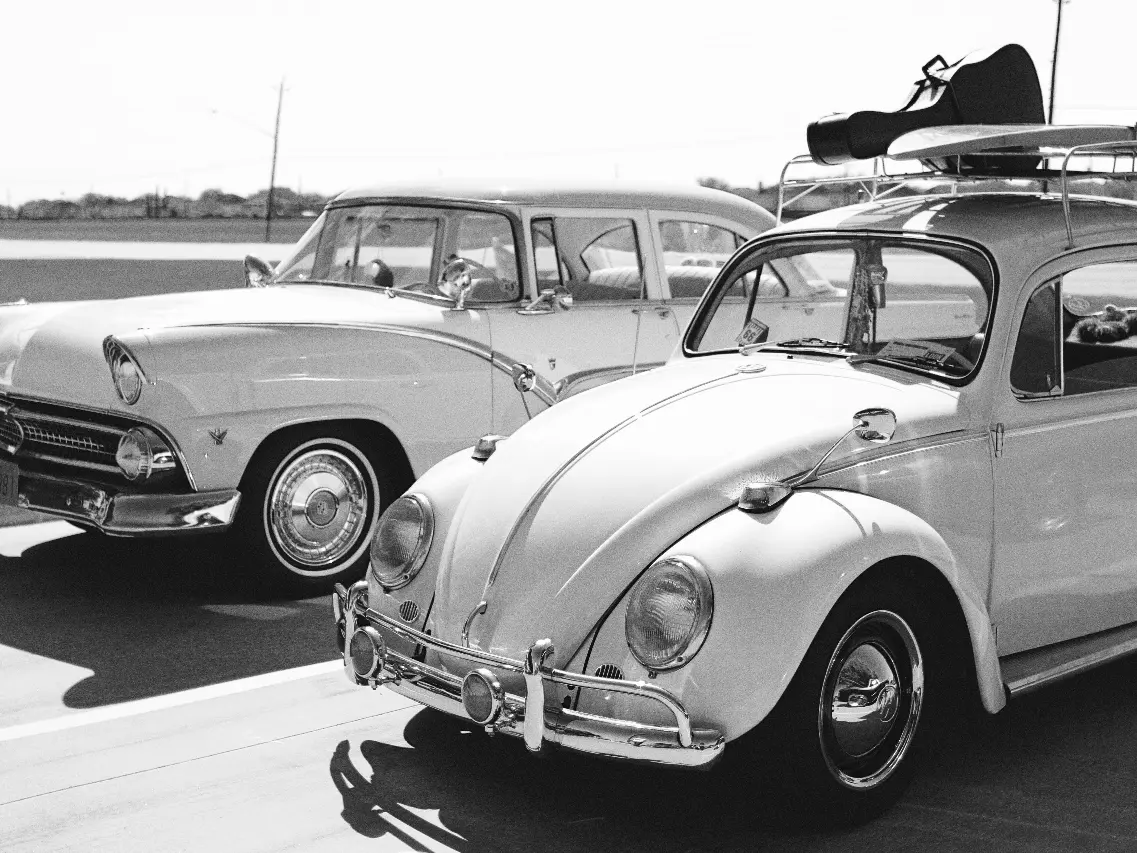 Black and white image of old cars